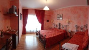 Postel nebo postele na pokoji v ubytování Hotel Internazionale