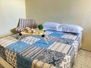 Ένα ή περισσότερα κρεβάτια σε δωμάτιο στο Paulinos Flat, Ubajara CE