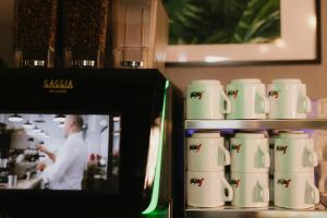 Příslušenství pro přípravu čaje a kávy v ubytování Economy Silesian Hotel