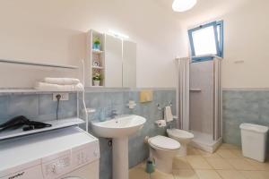 Koupelna v ubytování Donna Sandra casa vacanze + 9 fotografií