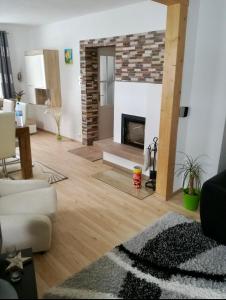 Ruang duduk di Ferienhaus Green Emotion