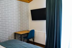 Sjónvarps- og/eða afþreyingartæki á Peak Hotel Kazbegi