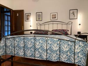 Postel nebo postele na pokoji v ubytování B&B RIO GRANDE