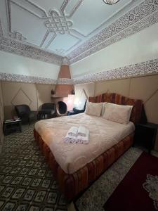Postel nebo postele na pokoji v ubytování Riad La Perla Bianca