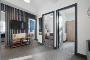 Μια τηλεόραση ή/και κέντρο ψυχαγωγίας στο Warm & Inviting 4-Bed on Church Road, Sleeps 4