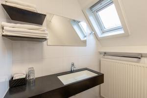 Kuchyň nebo kuchyňský kout v ubytování Hotel de Magneet + 37 fotografií