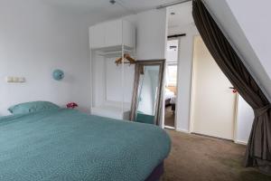 Postel nebo postele na pokoji v ubytování Hotel de Magneet