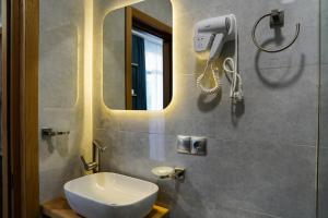 Baðherbergi á Peak Hotel Kazbegi