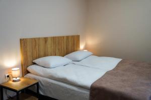 Rúm í herbergi á Peak Hotel Kazbegi