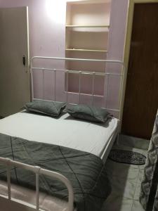 Postel nebo postele na pokoji v ubytování Parimala Residency 2nd Floor Room1