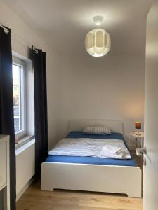 Ένα ή περισσότερα κρεβάτια σε δωμάτιο στο Balance Apartments by M&A Gartenstraße City