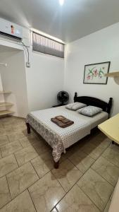 a bedroom with a bed in a room at Hotel Nils in Itapoa +37 photos