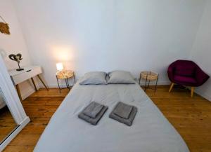 Ένα ή περισσότερα κρεβάτια σε δωμάτιο στο Le repos