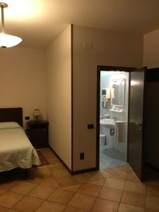 Ванная комната в Hotel Ristorante Il Cavaliere