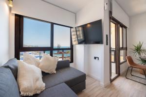 Khu vực ghế ngồi tại Duplex Aloha Playa 1018