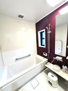 Koupelna v ubytování AZホテル Inn 奄美万屋 - Villa with private outdoor Jacuzzi + 27 fotografií