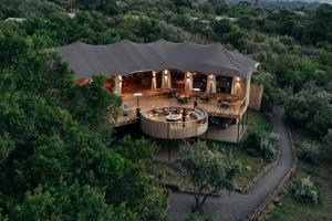 an overhead view of a house with a large roof at Pearl Mara in Masai Mara