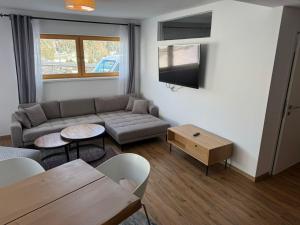 TV a/nebo společenská místnost v ubytování Appartement am Berg + 6 fotografií