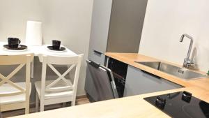 Kuchyň nebo kuchyňský kout v ubytování Reykjavík City Studio + 6 fotografií