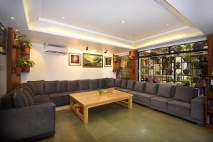 Area soggiorno di Hotel Mums Home