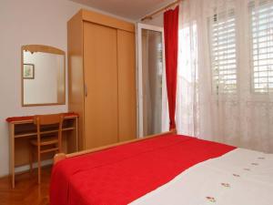 Postel nebo postele na pokoji v ubytování Apartments Dragica