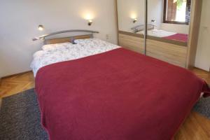 Posteľ alebo postele v izbe v ubytovaní Apartment Krivec