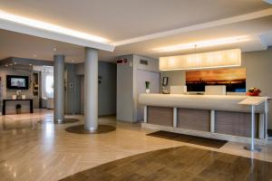 Kuchyň nebo kuchyňský kout v ubytování Hotel Executive