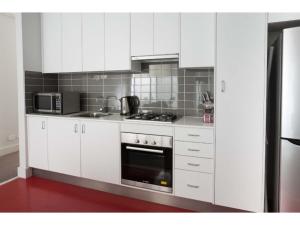 Η κουζίνα ή μικρή κουζίνα στο The Star Apartments