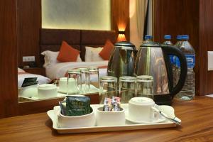 Set per la preparazione di tè e caffè presso Hotel Mums Home