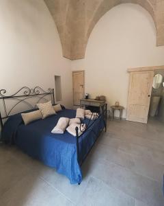 Postel nebo postele na pokoji v ubytování Il Trullo di Bina