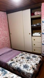Postel nebo postele na pokoji v ubytování Hostal Hibisco