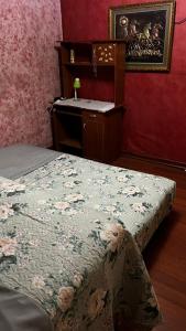 Postel nebo postele na pokoji v ubytování Hostal Hibisco
