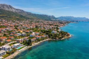 an aerial view of a town on the water at Villa Verde Royal in Kaštela