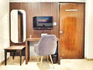 TV a/nebo společenská místnost v ubytování Hotel the terminal