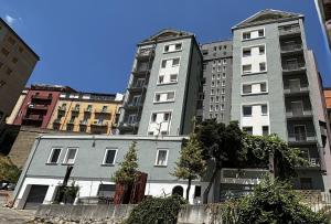 a group of tall buildings in a city at ESSENTIAL ROOM & PARKING in Centro Città con Parcheggio Privato e WIFI in Potenza