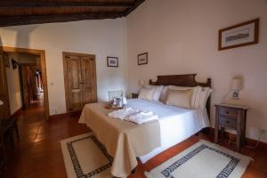 Postel nebo postele na pokoji v ubytování Casa De Anquiao - Turismo de Habitação + 37 fotografií