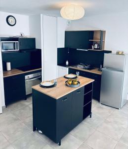 Dapur atau dapur kecil di Cosy T3 Beauzelle proche MEETT, tram et aéroport
