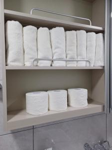 a bunch of towels on a shelf in a closet at With US 2 in Seoul