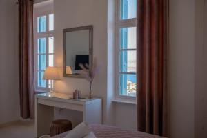 TV a/nebo společenská místnost v ubytování "Vela" Symi Village Residences