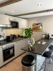 Kuchyň nebo kuchyňský kout v ubytování Sunset Cottage