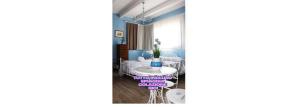 a dining room with blue walls and a table at B&B Villa Lilla spiaggia inclusa e bici gratuite a San Benedetto del Tronto Camere con terrazzo e Colazione inclusa in San Benedetto del Tronto +55 photos