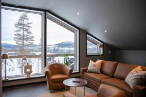 Posezení v ubytování Mountain Lodge