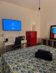 Postel nebo postele na pokoji v ubytování B&B RIO GRANDE