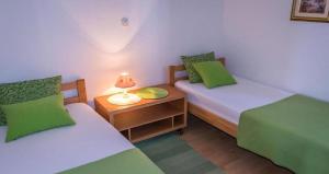 Posteľ alebo postele v izbe v ubytovaní Apartments Brane