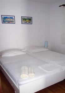 Postel nebo postele na pokoji v ubytování Apartment Jase