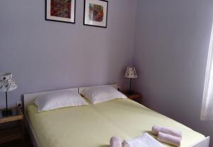 Postel nebo postele na pokoji v ubytování Apartment Jase