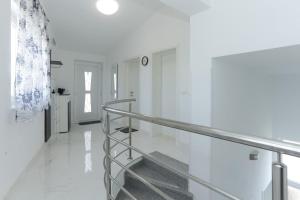 Kuchyňa alebo kuchynka v ubytovaní House Ivica