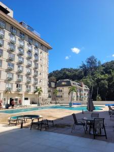 Bazén v ubytování Loft at Granja Brasil Itaipava nebo v jeho okolí