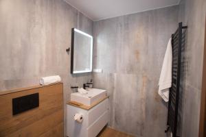Koupelna v ubytování Wellness Hotel Zavadilka + 37 fotografií