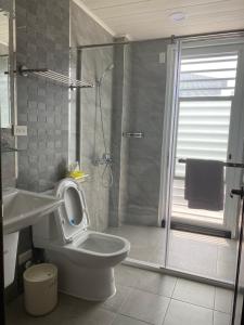 Koupelna v ubytování Orange Homestay